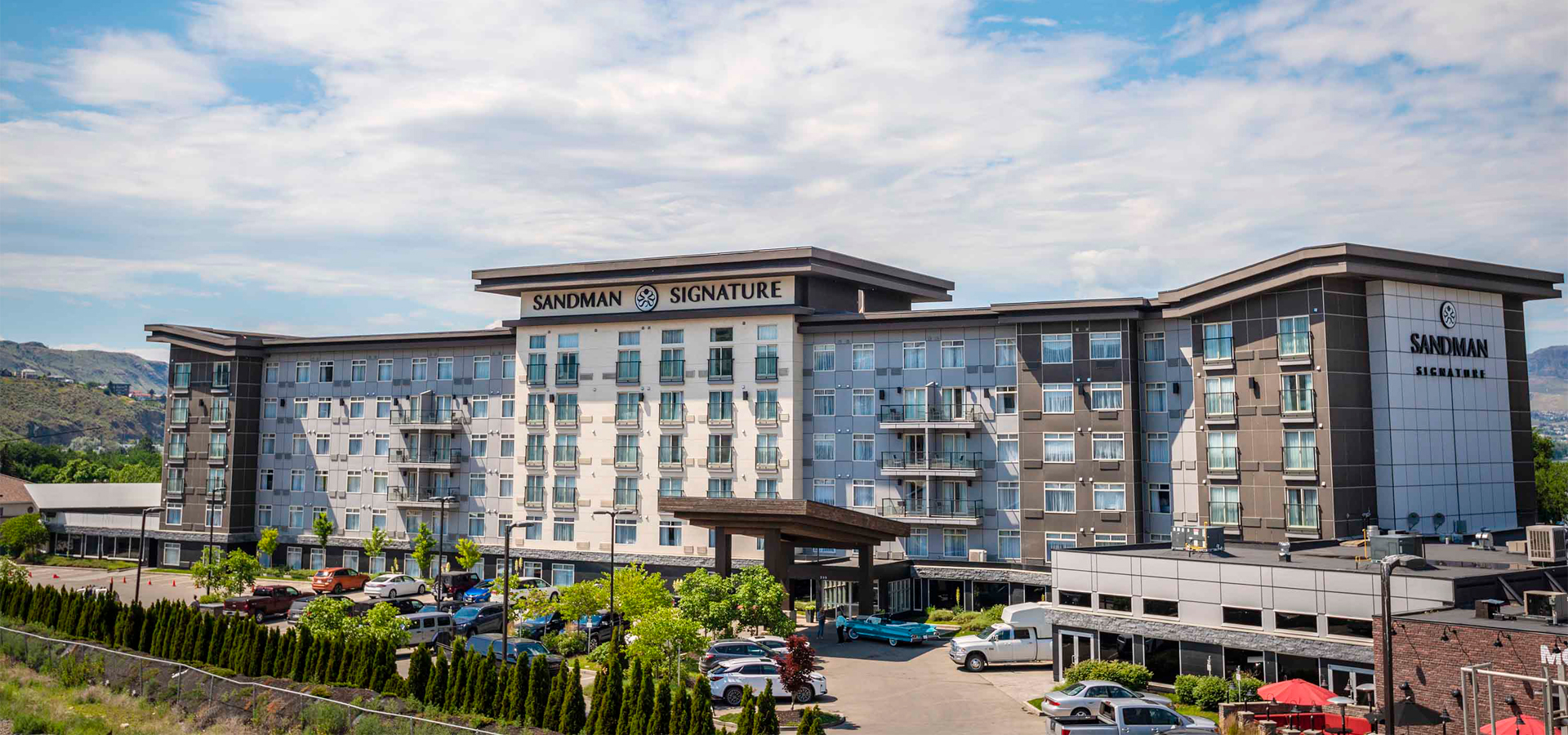 An outside view at a luxurious Sandman Hotel