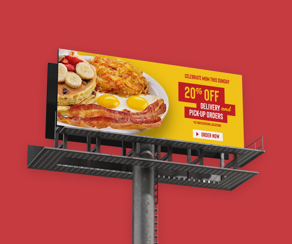 A billboard mockup showing a Denny's 20% off deal
